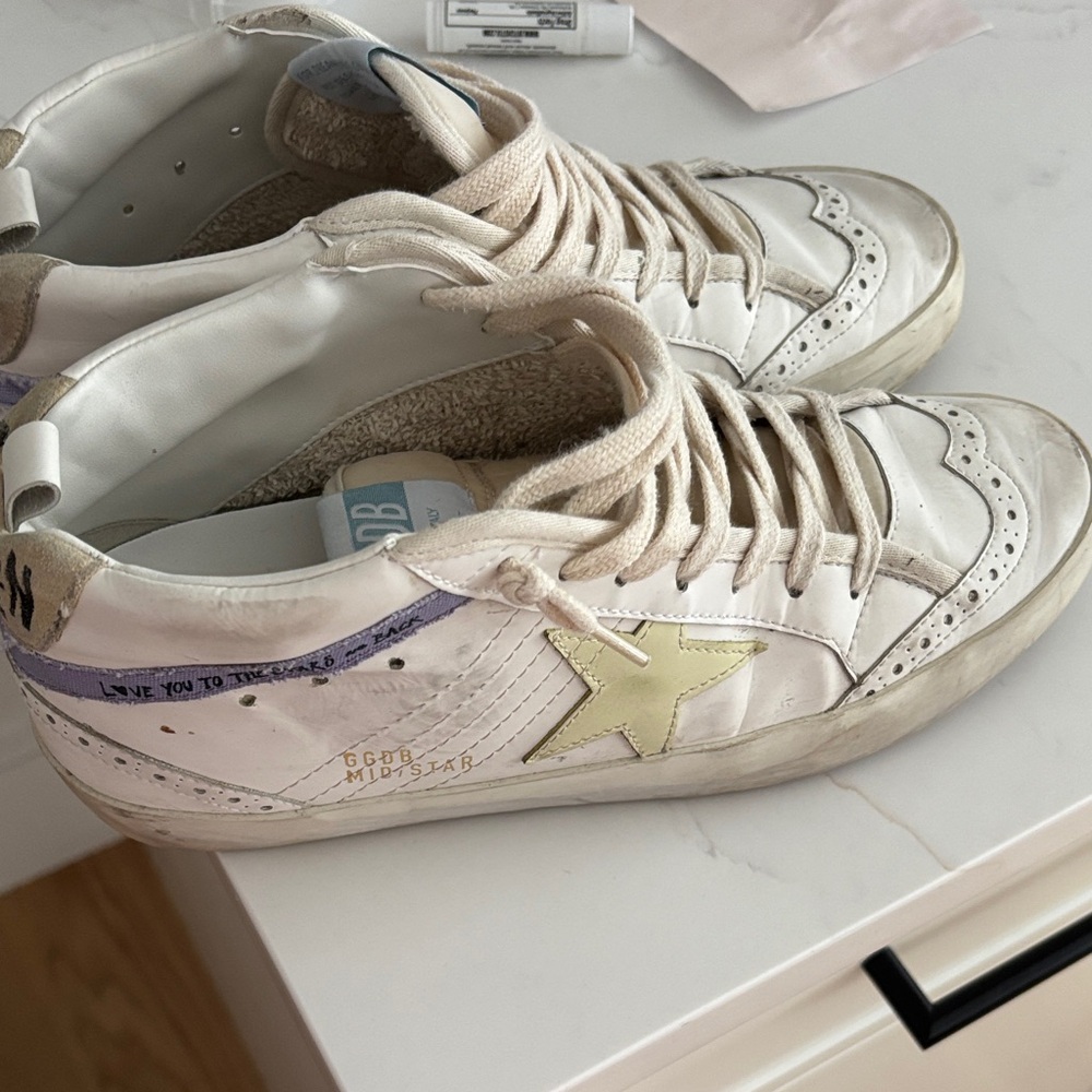 Golden goose mid star. Size 39. Very good used condition.